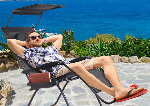 This guy is using the chair the way it was meant to be used: outdoors. The fool.